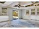 Sunlit living room featuring sliding glass doors and multiple windows for plenty of natural light at 218 32Nd W St, Bradenton, FL 34205