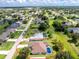 Aerial view of a home with pool in a lush neighborhood at 234 Antofagasta St, Punta Gorda, FL 33983