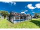 Expansive backyard featuring a refreshing pool, perfect for outdoor enjoyment at 234 Antofagasta St, Punta Gorda, FL 33983