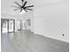 Large living room offers tile floors, neutral paint, and vaulted ceilings at 234 Antofagasta St, Punta Gorda, FL 33983