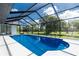 A stunning view of a screened pool area, perfect for entertaining and relaxation at 234 Antofagasta St, Punta Gorda, FL 33983