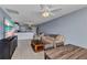Inviting open-plan living space with tile floors that flows into the dining and kitchen areas at 25100 Sandhill Blvd # V202, Punta Gorda, FL 33983