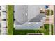 Aerial view of roof, landscaping, and surrounding community at 26548 Castleview Way, Wesley Chapel, FL 33544