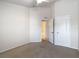 Bright carpeted bedroom with ensuite bathroom access at 26548 Castleview Way, Wesley Chapel, FL 33544