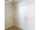 Walk-in closet features installed shelving for optimal storage at 26548 Castleview Way, Wesley Chapel, FL 33544