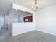 Elegant dining area featuring tile floors and a modern chandelier, perfect for gatherings and entertaining at 26548 Castleview Way, Wesley Chapel, FL 33544