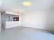 This bright living room features tiled flooring and ample space, perfect for entertaining at 26548 Castleview Way, Wesley Chapel, FL 33544