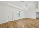 Spacious bedroom with light-colored floors, recessed lights, and modern finishes at 2813 Sally Ln, North Port, FL 34286