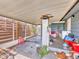 Back porch with wood floors and screened in panels at 2818 Olympic St, Sarasota, FL 34231