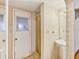 Cozy bathroom featuring floral wallpaper and a pedestal sink at 2818 Olympic St, Sarasota, FL 34231