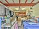 Functional garage with storage shelving and ample workspace at 2818 Olympic St, Sarasota, FL 34231