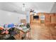 The large living room has a ceiling fan and features stylish wood trim at 2818 Olympic St, Sarasota, FL 34231