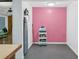 Pink room with cleaning supplies at 2818 Olympic St, Sarasota, FL 34231