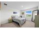 Comfortable bedroom with a queen size bed, and a view at 2824 Pearly Banks Dr, Bradenton, FL 34208