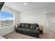 Upstairs bonus room with a window with a view and neutral colors at 2824 Pearly Banks Dr, Bradenton, FL 34208