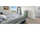 Comfortable bedroom with a queen size bed, and a view at 2824 Pearly Banks Dr, Bradenton, FL 34208