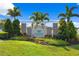 A welcoming entrance sign with manicured greenery and palm trees, setting an inviting tone to the community at 2824 Pearly Banks Dr, Bradenton, FL 34208