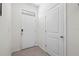Bright foyer features tile flooring and a white front door at 2824 Pearly Banks Dr, Bradenton, FL 34208