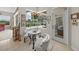 Cozy eating area with decorative chandelier and views to the backyard at 2937 Seasons Blvd, Sarasota, FL 34240