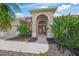 Inviting front entrance with well-maintained landscaping, walkway, and covered porch at 2937 Seasons Blvd, Sarasota, FL 34240