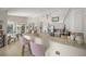 Well-equipped kitchen featuring a breakfast bar with seating and stainless steel appliances at 2937 Seasons Blvd, Sarasota, FL 34240