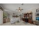 Open concept living space with modern decor, stylish furniture, and kitchen views at 2937 Seasons Blvd, Sarasota, FL 34240