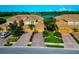 Beautifully landscaped townhomes with brick paved driveways with attached garages and serene lake views at 318 Winding Brook Ln # 104, Bradenton, FL 34212