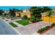 Landscaped driveways and townhomes, adding to the curb appeal of this neighborhood, with attached two-car garages at 318 Winding Brook Ln # 104, Bradenton, FL 34212