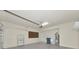 Clean two car garage with plenty of space and shelving at 318 Winding Brook Ln # 104, Bradenton, FL 34212