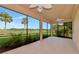 Enclosed lanai featuring a view of a golf course at 318 Winding Brook Ln # 104, Bradenton, FL 34212