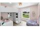 Charming bedroom features a lofted bed, bright window, and a cozy, colorful aesthetic at 327 Francis Dr, Apollo Beach, FL 33572