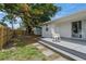 Charming backyard with a deck, creating an inviting outdoor living space at 3310 W 9Th Ave, Bradenton, FL 34205