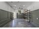 Spacious basement with exposed ceiling, shelving, and window at 3310 W 9Th Ave, Bradenton, FL 34205