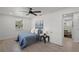 Well-lit bedroom with a window and adjacent bathroom at 3310 W 9Th Ave, Bradenton, FL 34205