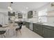 Modern kitchen featuring stainless steel appliances, sleek countertops, and ample cabinet space at 3310 W 9Th Ave, Bradenton, FL 34205
