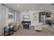 Bright living room featuring hardwood floors, recessed lighting, and comfortable seating at 3310 W 9Th Ave, Bradenton, FL 34205