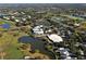 Stunning aerial view of the golf course community with manicured landscaping and resort-style amenities at 340 Bermuda Ct # 5, Venice, FL 34293