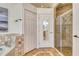 Bathroom with tile flooring, walk-in shower with glass door, and soaking tub at 340 Bermuda Ct # 5, Venice, FL 34293