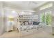 Charming bedroom features a bunk bed with vibrant bedding and bright natural light from the window at 340 Bermuda Ct # 5, Venice, FL 34293