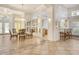 Dining area is adjacent to breakfast bar and a spacious area for gatherings at 340 Bermuda Ct # 5, Venice, FL 34293