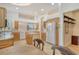 Open kitchen with island, stainless appliances and a view to the breakfast nook at 340 Bermuda Ct # 5, Venice, FL 34293