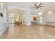 Open floor plan with tile flooring, kitchen bar, dining room, and high ceilings at 340 Bermuda Ct # 5, Venice, FL 34293