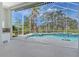 Screened pool area with spa offers stunning views and outdoor enjoyment, creating a serene retreat at 340 Bermuda Ct # 5, Venice, FL 34293