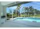 Beautiful screened in pool with water feature and hot tub overlooking the golf course at 340 Bermuda Ct # 5, Venice, FL 34293