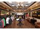 Well-appointed pro shop with stylish displays of golf apparel and accessories, showcasing a sophisticated shopping experience at 340 Bermuda Ct # 5, Venice, FL 34293