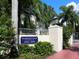 Community sign with lush landscaping and elegant design promoting Hamilton Club Circle residences at 3954 Hamilton Club Cir # 14, Sarasota, FL 34242
