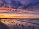 Beautiful sunset view over the beach with birds and colorful sky at 3954 Hamilton Club Cir # 14, Sarasota, FL 34242