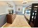 bedroom featuring a wooden bunk bed, dresser, and soft blue walls at 4716 98Th E Ter, Parrish, FL 34219