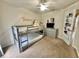 This bedroom includes a bunk bed, dresser and closet for storage at 4716 98Th E Ter, Parrish, FL 34219