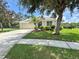 Charming single-story home with a well-kept lawn, landscaping, a two-car garage, and a welcoming entryway at 4716 98Th E Ter, Parrish, FL 34219